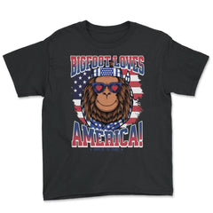 Patriotic Bigfoot Loves America! 4th of July graphic - Youth Tee - Black